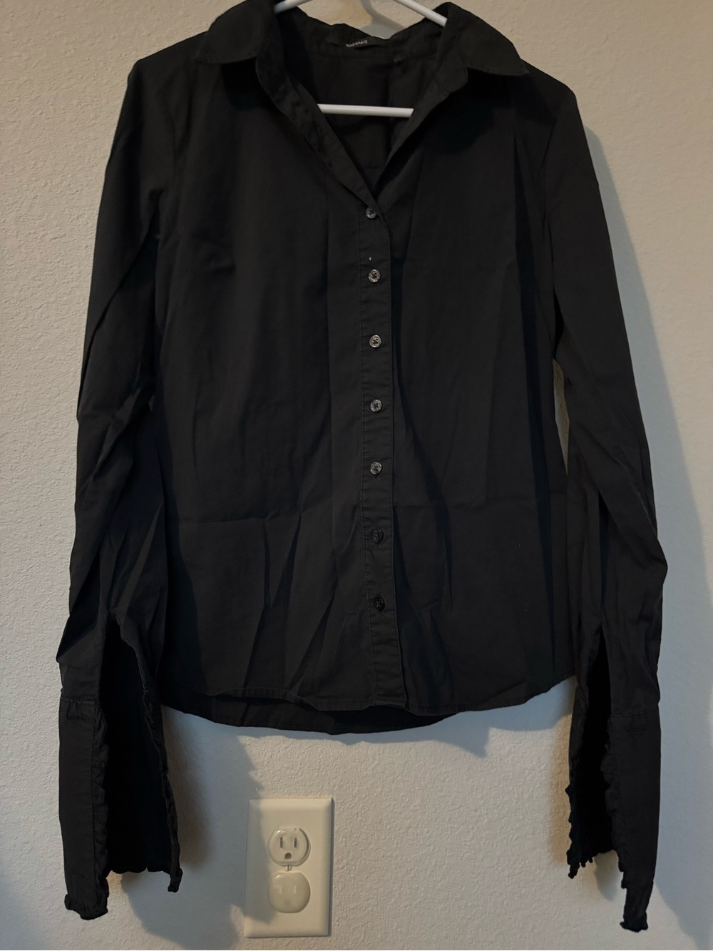 Black Button Shirt with extra long ruffled sleeves.